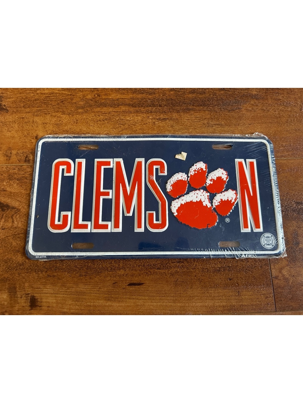Clemson Tigers Metal License Plate with Paw Print Logo